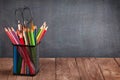 School and office supplies on classroom table Royalty Free Stock Photo