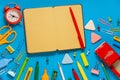 School office supplies on a desk with copy space. Back to school concept. School supplies on blue background. Back 2 school Royalty Free Stock Photo