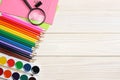 School and office supplies. school background. colored pencils, pen, pains, paper for school and student education Royalty Free Stock Photo