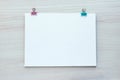 School office supplies on wooden background. Back to school concept. White board with hands for copy space. Top view Royalty Free Stock Photo