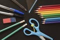 School and Office Utensils on a Dark Surface Royalty Free Stock Photo