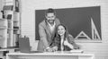 school. positive kid with teacher in classroom use laptop. back to school. Royalty Free Stock Photo