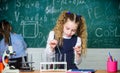 School pupil study chemical liquids. School chemistry lesson. Test tubes with substances. Future microbiologist Royalty Free Stock Photo