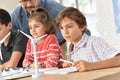 School pupils in class learning about natural energy resources Royalty Free Stock Photo