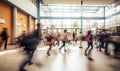 School pupils rushing through the corridors of a modern school, motion blur