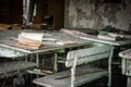 School room desk and book in Chernobyl close up