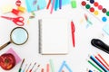 School set with notebooks, pencils, brush, scissors and apple on white background Royalty Free Stock Photo