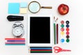 School set with notebooks, pencils, brush, scissors and apple on white background Royalty Free Stock Photo