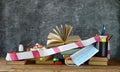 School shutdown, during corona pandemic,desk with books and school supplies, face mask and disinfecting agent Royalty Free Stock Photo