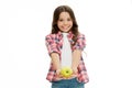 School snack concept. Apple vitamin snack. Girl cute long curly hair holds apple fruit white background. Child girl