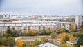 School stadium inside a block of old apartment buildings against the backdrop of a television tower. Sleeping urban areas. Autumn Royalty Free Stock Photo