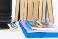 School stationery accessories - notebook, copybook, laptop, plastic folder, pens, glasses, paper clips, stickers, notepads, Royalty Free Stock Photo