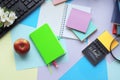 School stationery, books, cup of tea, apple tree flowers on the table, home teaching concept Royalty Free Stock Photo