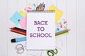 School stationery or office supplies on wood background. Royalty Free Stock Photo