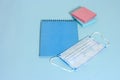 School stationery supplies, medical masks and hand gel sanitizer, keep your distance, open school, go back to school for the Royalty Free Stock Photo