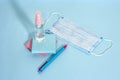 School stationery supplies, medical masks and hand gel sanitizer, keep your distance, open school, go back to school for the Royalty Free Stock Photo