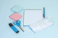 School stationery supplies, medical masks and hand gel sanitizer, keep your distance, open school, go back to school for the Royalty Free Stock Photo