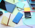 School stationery, tablet, phone on the desk, home schooling concept