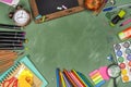 School statonery on green blackboard Royalty Free Stock Photo