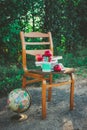 School still life with apples, globe, books