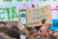Fridays for future: students hands showing banners and boards: time is ending