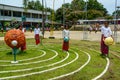 School student girls playing solar system orbit game Royalty Free Stock Photo