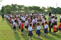 School students in Ayuthaya region, Thailand in front of their school