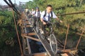 School students go to school through the suspension bridge Royalty Free Stock Photo