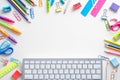 School supples and keyboard on white background. Flat lay, top view colorful stationery. E-learning, online school concept Royalty Free Stock Photo