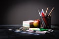 School supplies on the background of blackboard Royalty Free Stock Photo