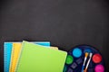 School supplies on the background of the blackboard ready for your design Royalty Free Stock Photo