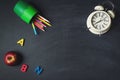 School supplies background flat lay on blackboard, back to school concept Royalty Free Stock Photo