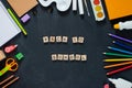 School supplies on black board background. Back to school concept. Frame, flatlay, copy space for text. Royalty Free Stock Photo