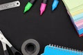 School supplies on black board background. Back to school concept. Royalty Free Stock Photo