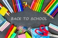 Back to school blackboard with school supplies on it Royalty Free Stock Photo