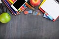 School supplies on blackboard background Royalty Free Stock Photo