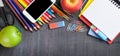 School supplies on blackboard background Royalty Free Stock Photo