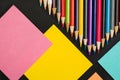 School supplies border on black chalkboard background. Top view photograph Royalty Free Stock Photo