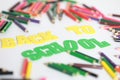 Back to school ,School supplies colored pencils in Fall scattered, isolated Royalty Free Stock Photo