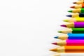 School supplies colored pencils in a row Royalty Free Stock Photo