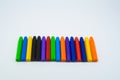 School supplies, colourful crayons stationery on white background Royalty Free Stock Photo