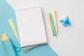 School supplies concept. Top view photo of yellow and blue school accessories notebooks plane shaped sharpener pens and pencil- Royalty Free Stock Photo