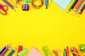 School supplies double border over a yellow background