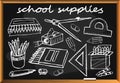 School supplies hand drawn on blackboard. Royalty Free Stock Photo