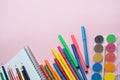 School supplies lay on pink background, back to school concept, copy space. Royalty Free Stock Photo