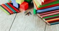 School supplies lying on the wooden floor