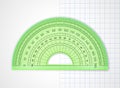 School supplies. Measuring tool. Green transparent plastic protractor Royalty Free Stock Photo