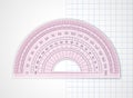 School supplies. Measuring tool. Pink transparent plastic protractor Royalty Free Stock Photo