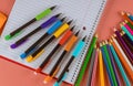 School supplies with a notebooks and colors pencils Royalty Free Stock Photo