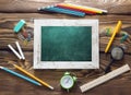 School supplies objests back to school blackboard on wooden back Royalty Free Stock Photo